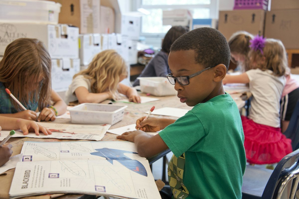 Young learners drawing together